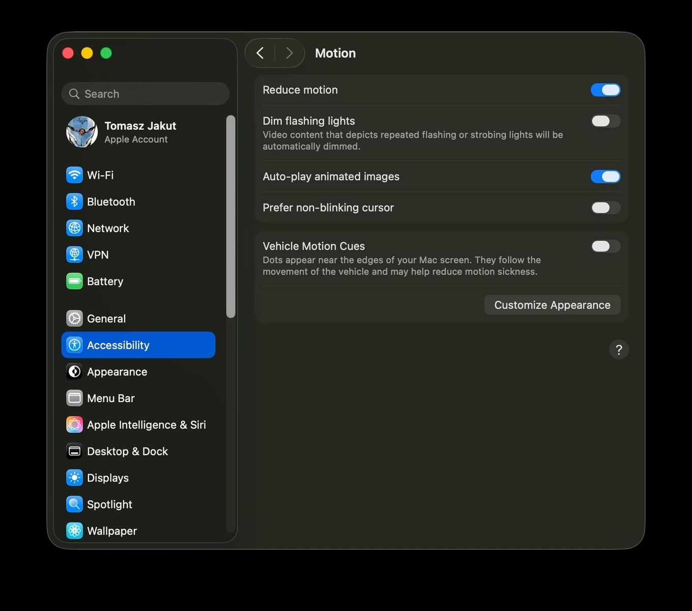 Aplikacja Ustawienia, zakładka "Accessibility", podsekcja "Motion"; dostępne utawienia: "Reduce motion", "Dim flashing lights", "Auto-play animated images", "Prefer non-blinking cursor", "Vehicle Motion Cues".